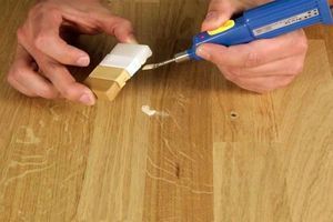 Как убрать царапины с паркетной доски